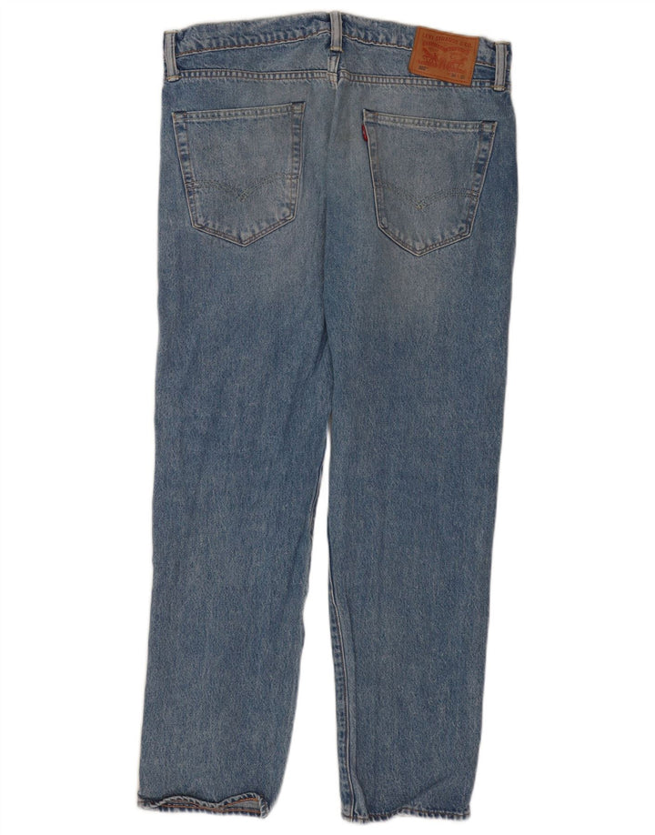 Levi's muške 502 sužene traperice W34 L32 plavi pamuk
