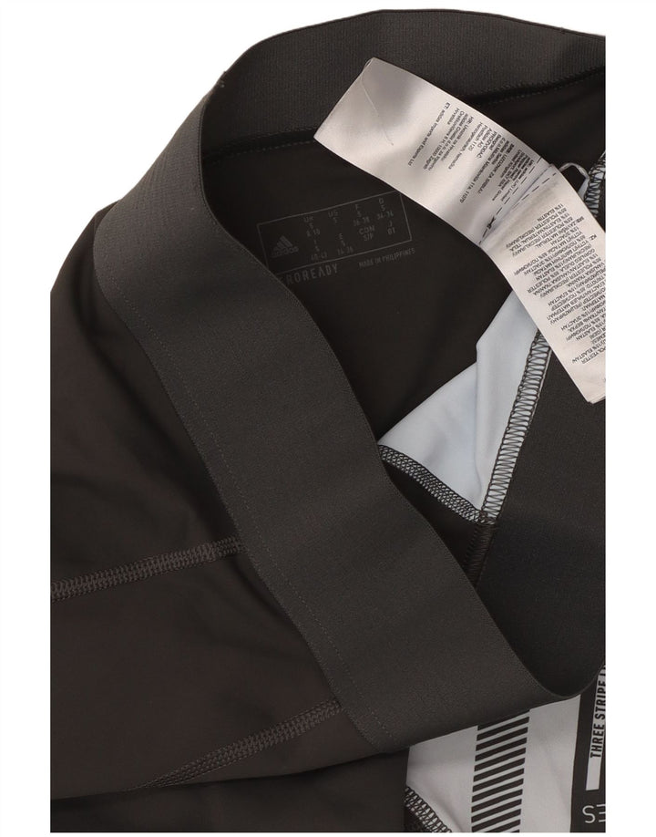 ADIDAS ženske tajice s tri pruge UK 8/10 male crne geometrijske