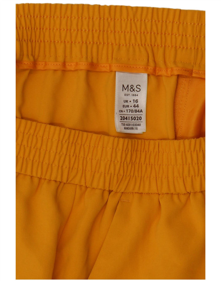 Marks & Spencer ženska ravna suknja UK 16 velika W34 žuti poliester