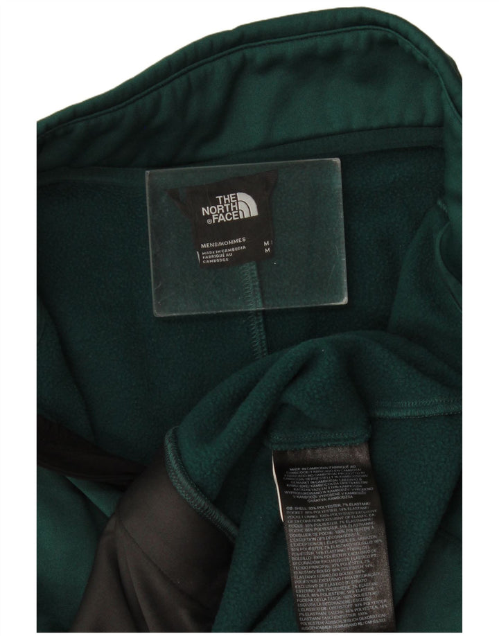 The North Face muška trenirka gornja jakna srednje zelene boje od poliestera