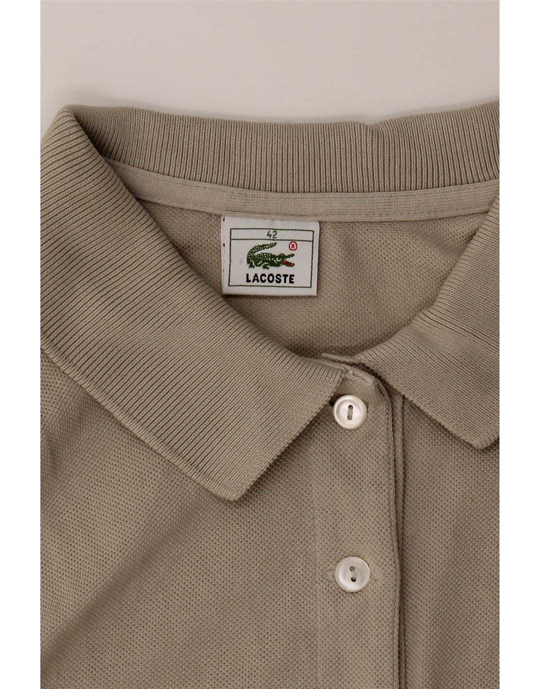 Lacoste ženska polo majica bez rukava EU 42 velika siva