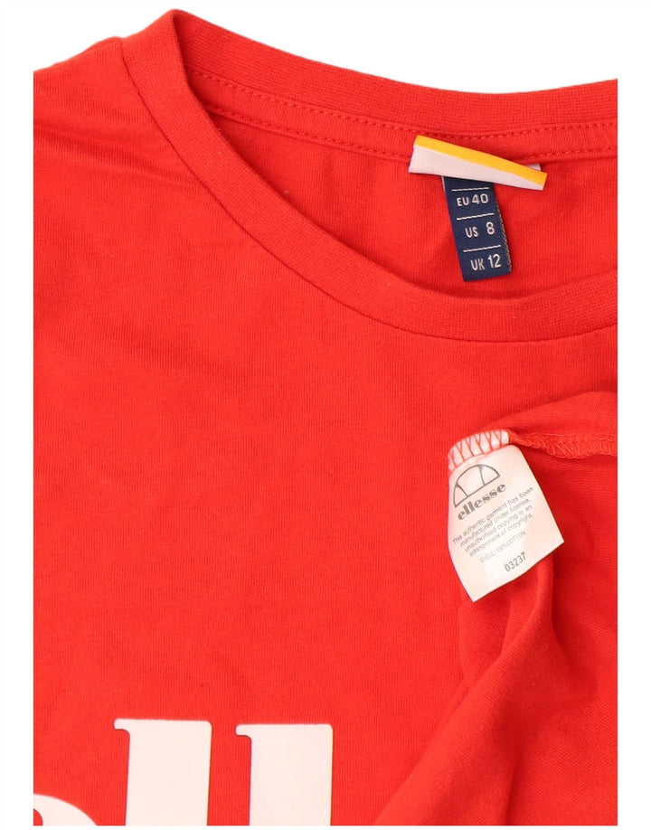 Ellesse ženska majica kratkih rukava s grafičkim motivima UK 12 Srednje crveni pamuk