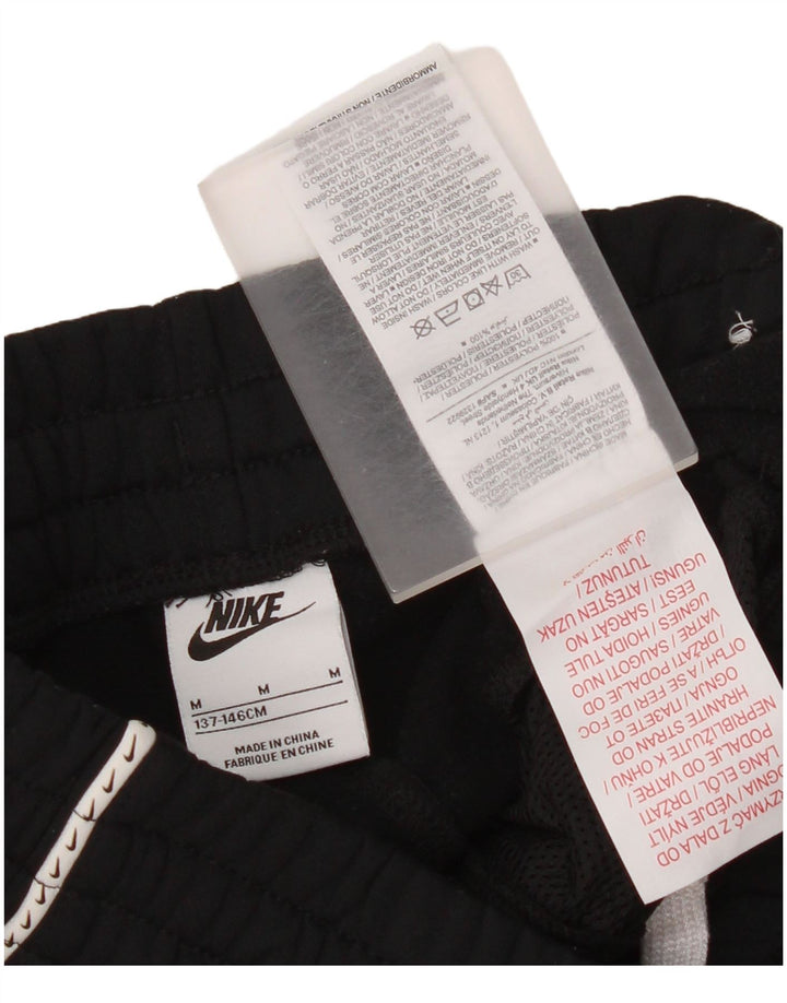Nike Hlače za trenirku za djevojčice 10-11 godina srednje crne poliesterske boje