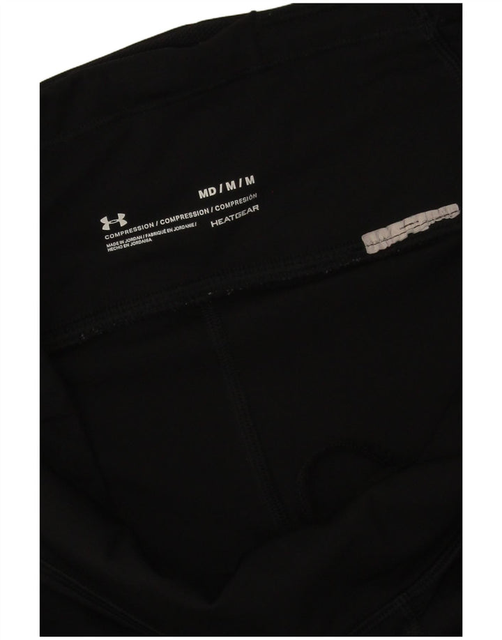 Ženske tajice s apstraktnim uzorkom Under Armour Heat Gear UK 12 srednje crne