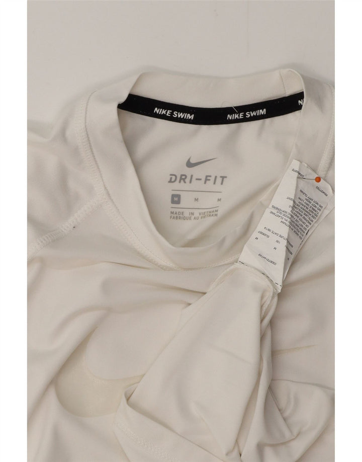 NIKE Ženska majica kratkih rukava Dri Fit Graphic Top UK 12 Srednje bijeli poliester