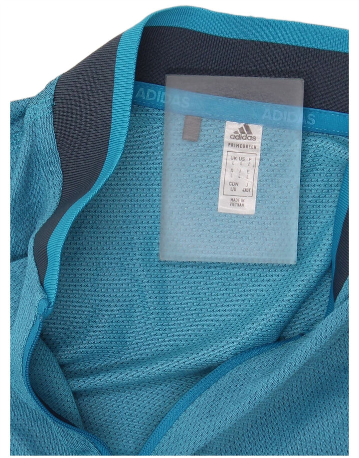 Adidas ženski prsluk UK 14 Large Blue Colourblock