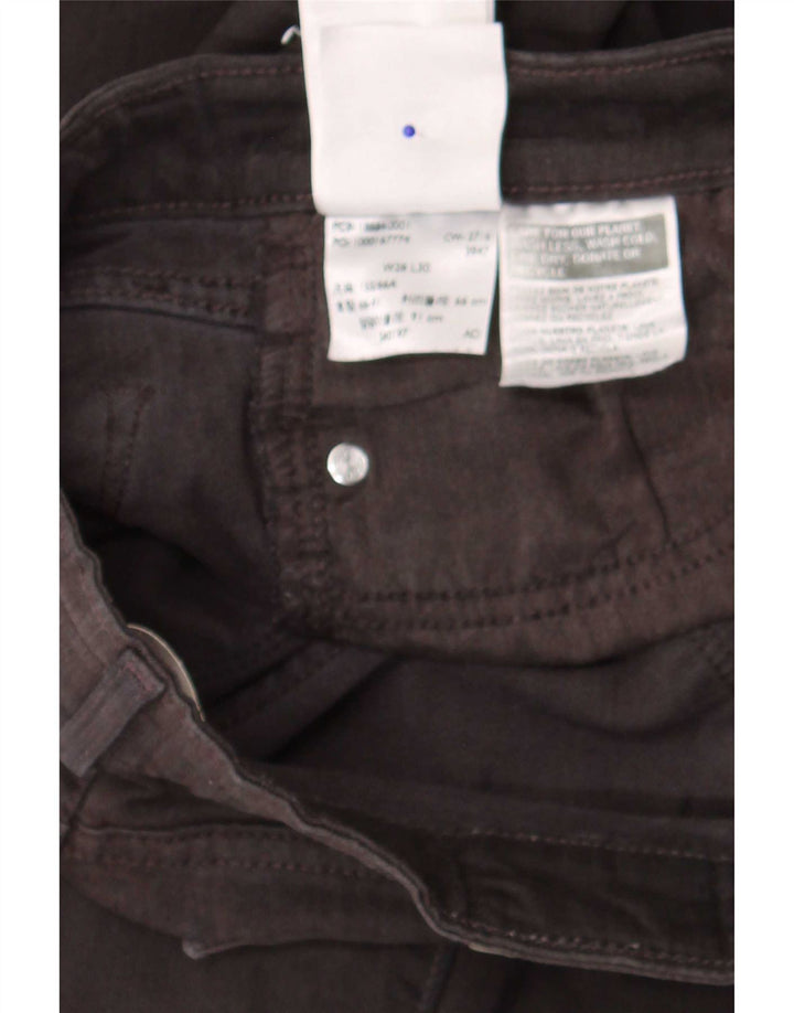 Levi's ženske 712 uske traperice W26 L30 crni pamuk