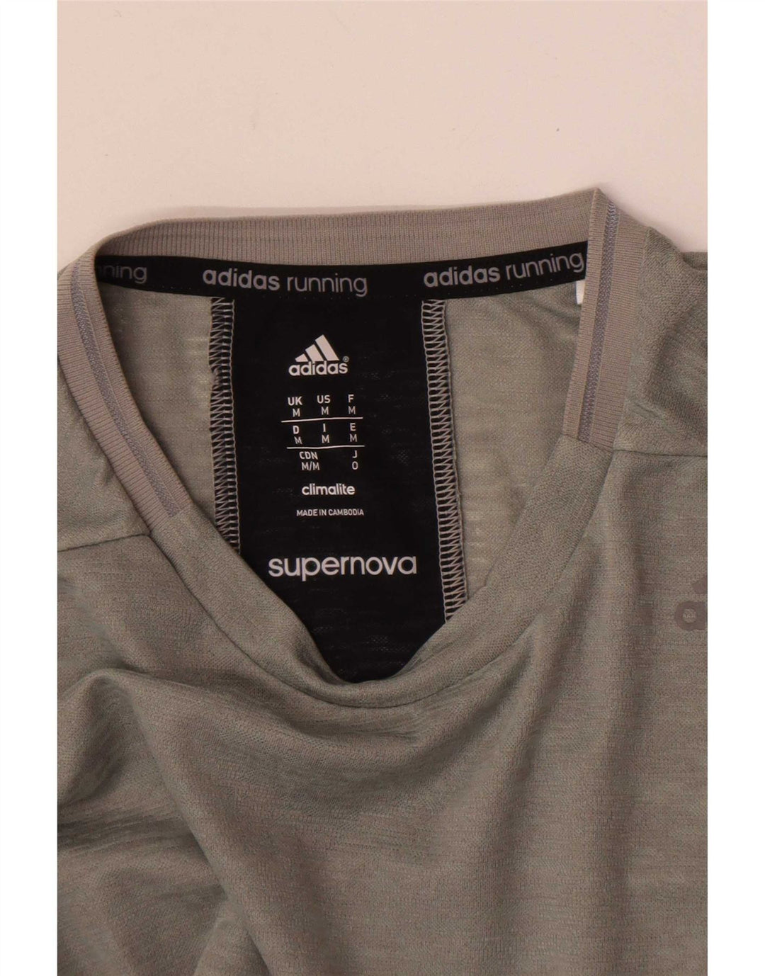 Adidas muška majica Supernova s dugim rukavima srednje sive boje s pjegama