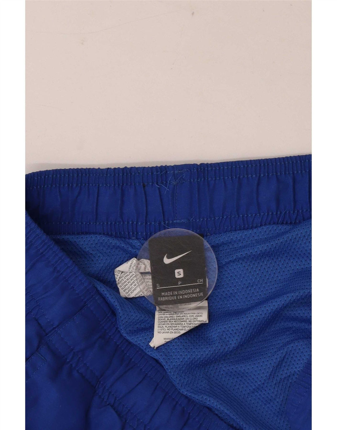 Male plave sportske hlače od poliestera Nike Graphic Regular Sport