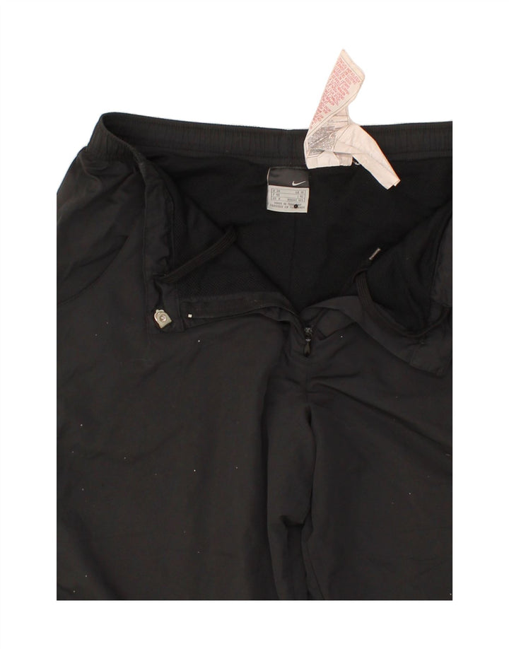 NIKE Womens Capri Tracksuit Trousers UK 10 Small Black Polyester Vintage Nike and Second-Hand Nike from Messina Hembry 