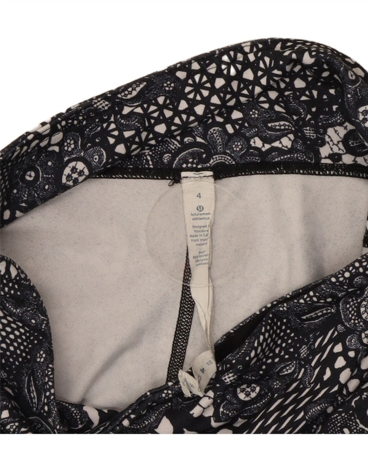 Lululemon ženske kapri tajice US 4 male crne cvjetne poliesterske
