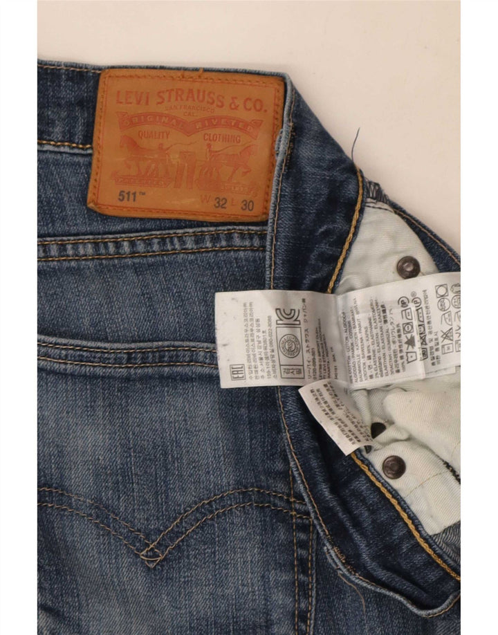 Levi's muške 511 uske traperice s oštećenjem W32 L30, plavi pamuk