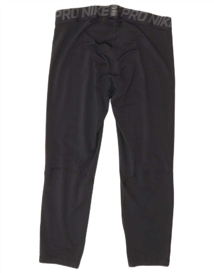 Nike Dri Fit Graphic Crop Leggings velike crne poliesterske