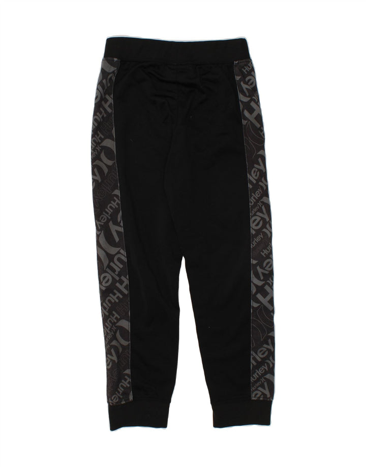 HURLEY Boys Graphic Tracksuit Trousers Joggers 5-6 Years Black Polyester Vintage Hurley and Second-Hand Hurley from Messina Hembry 