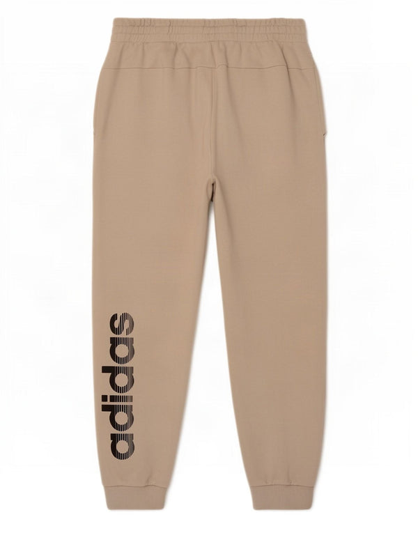Adidas Ženske hlače za trenirku s grafičkim motivima Joggers UK 16/18 Large Beige