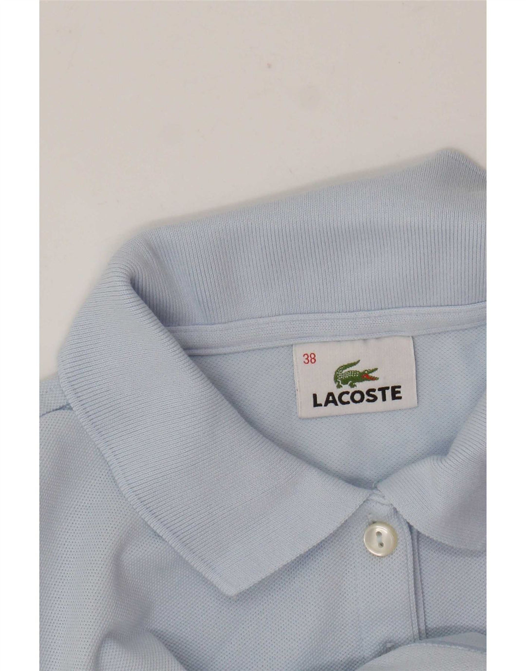 Lacoste ženska polo majica veličina 38 srednje plava