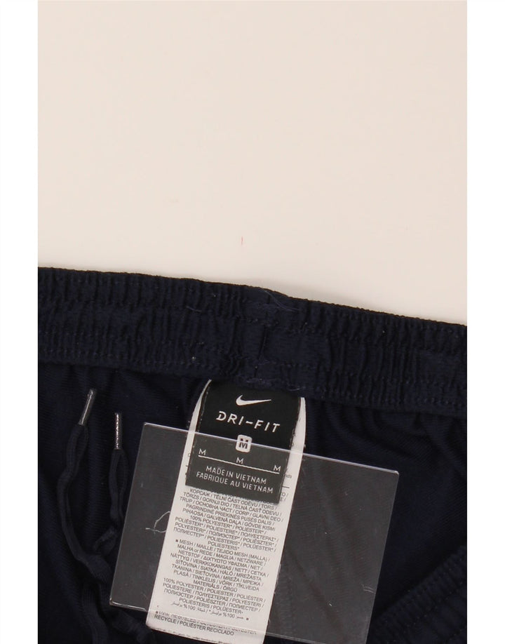 NIKE Mens Dri Fit Tracksuit Trousers Medium  Navy Blue Colourblock Vintage Nike and Second-Hand Nike from Messina Hembry 