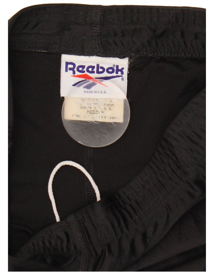Reebok ženske tajice UK 12 Medium Black Colourblock poliester