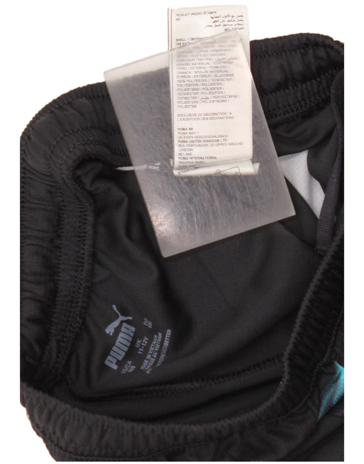 PUMA Sportske kratke hlače Manchester City za dječake 11-12 godina crne boje