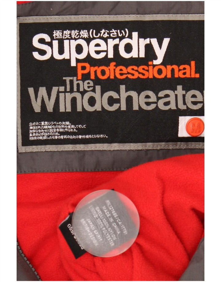 Superdry ženska vjetrovka s grafičkim motivima UK 12 srednje siva