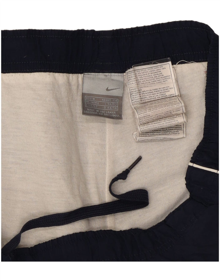 Nike muške hlače za trenirku UK 38/40 srednje tamnoplave najlonske hlače