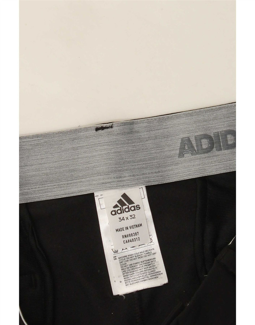 Adidas muške ravne chino hlače W34 L32 crni poliester