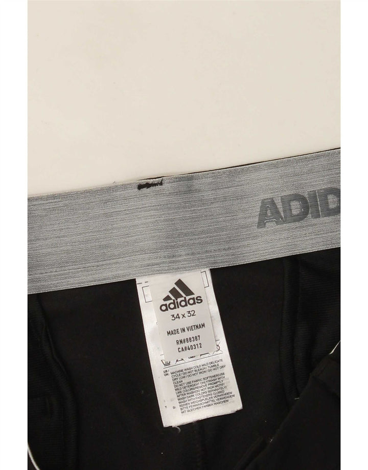 Adidas muške ravne chino hlače W34 L32 crni poliester