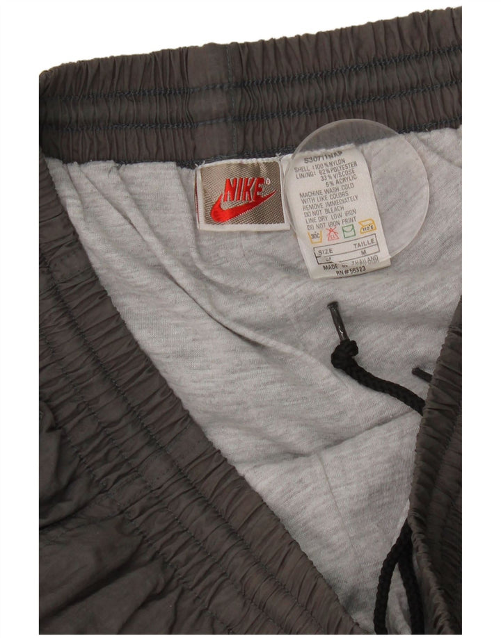 Nike muške trenirke, srednje sive najlonske hlače