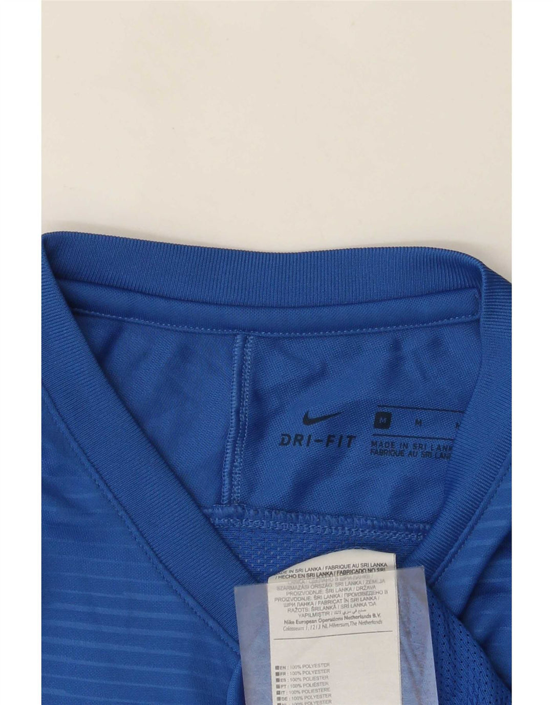 Nike Dri Fit majica kratkih rukava srednje veličine s plavim prugama od poliestera