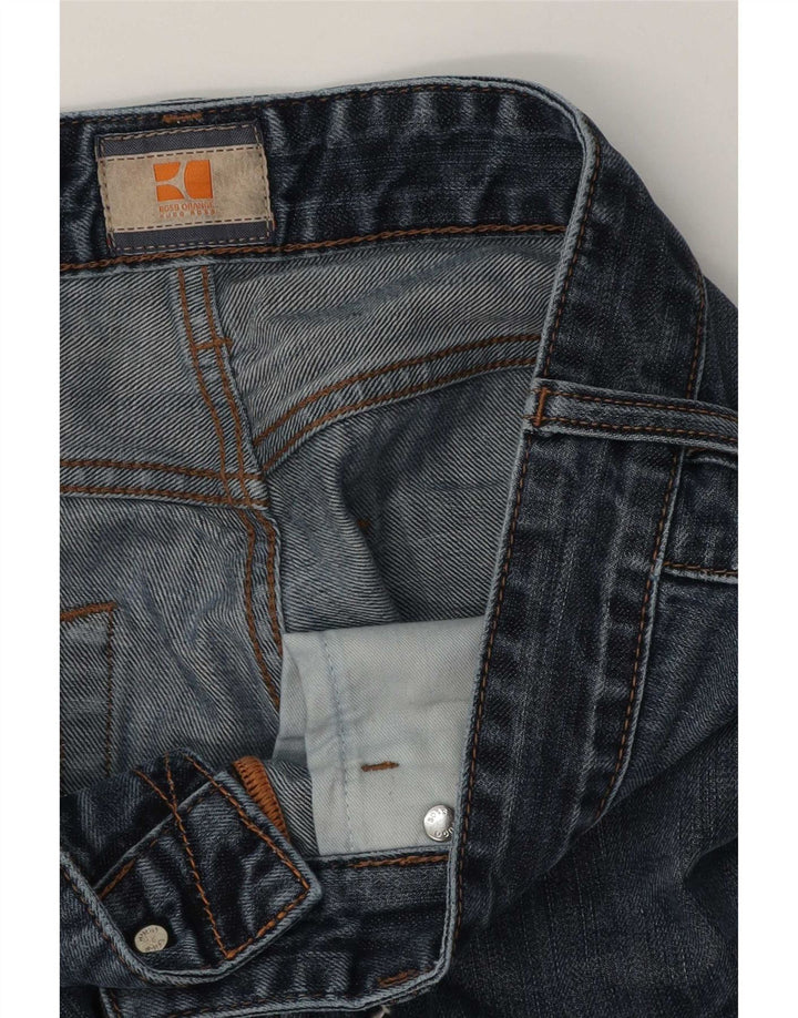 Hugo Boss muške ravne traperice W32 L30 plave