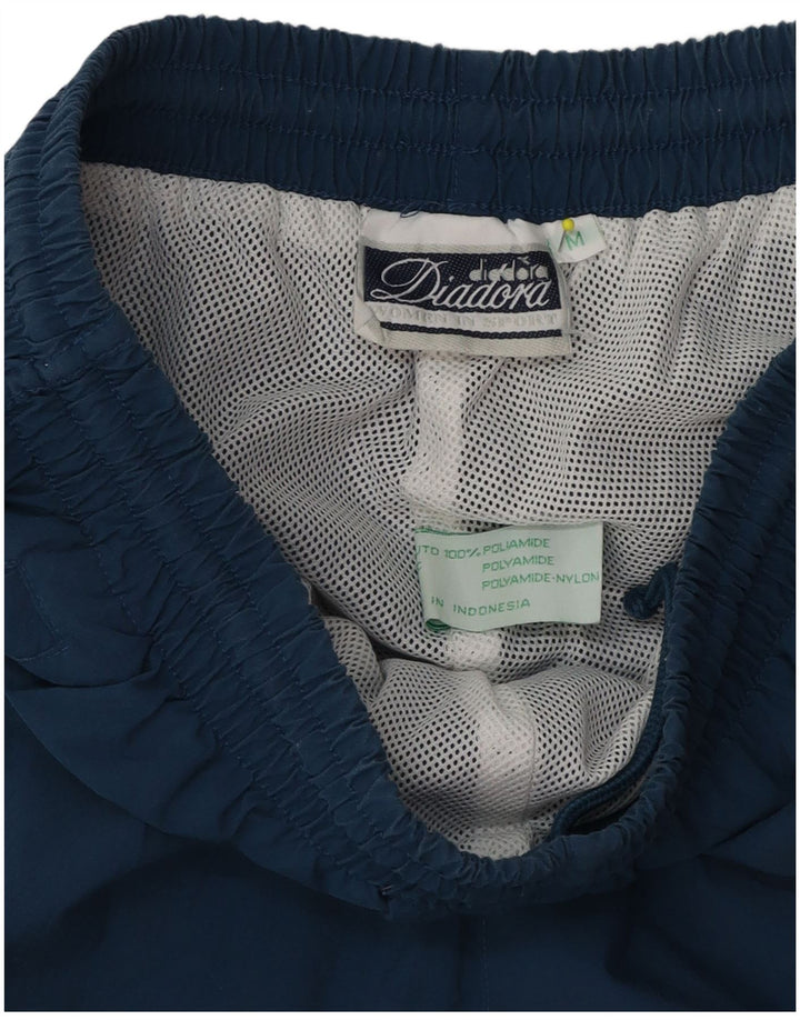 Diadora muške trenirke srednje plavi poliester