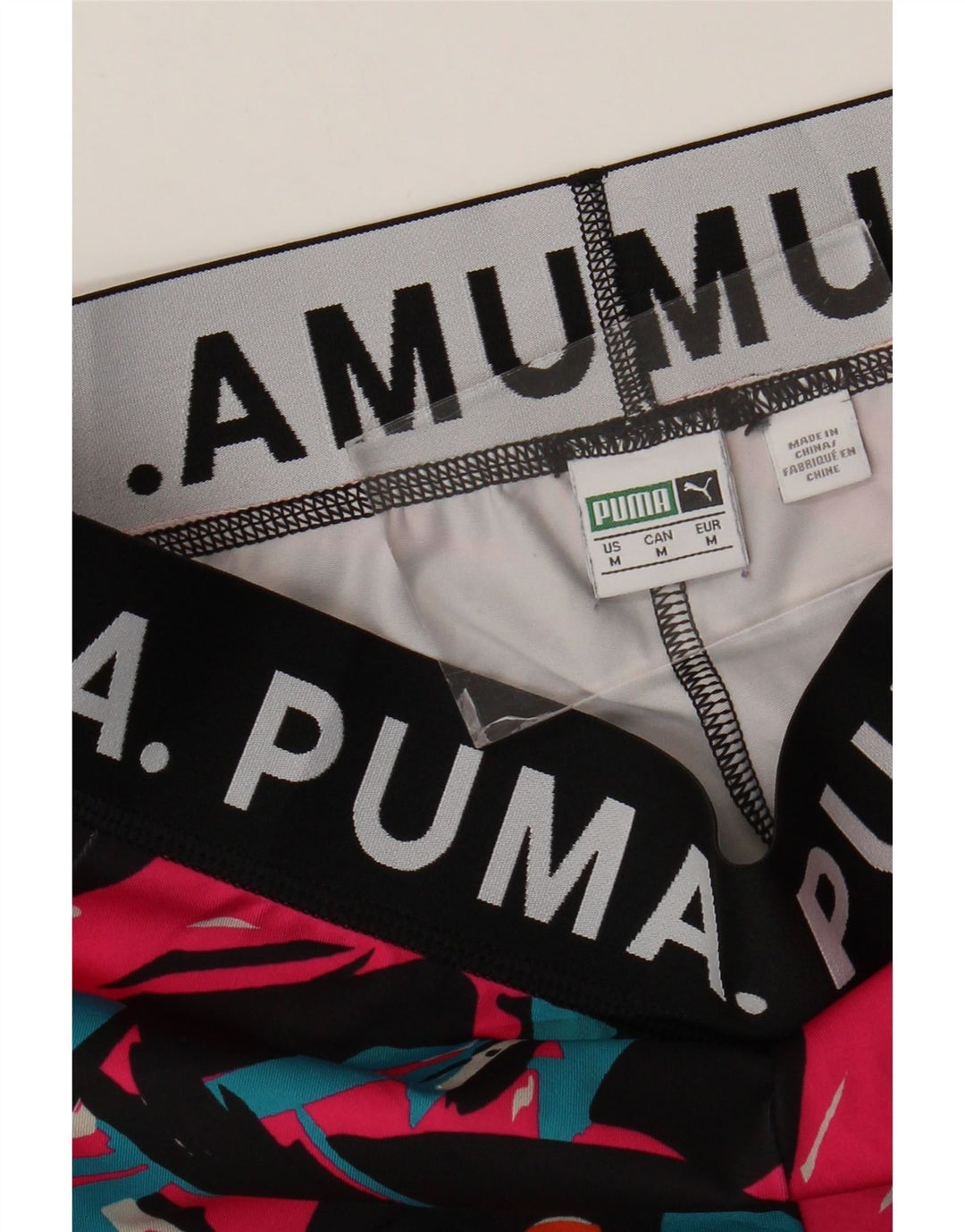 Puma ženske grafičke tajice UK 12 Medium Multicolored Geometric