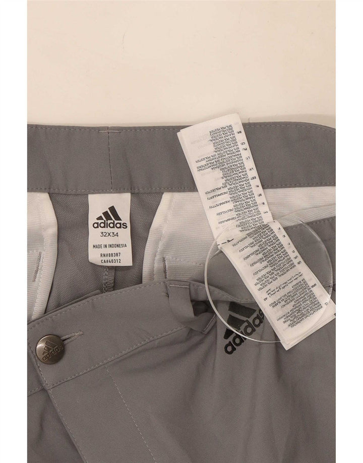 Adidas muške uske chino hlače W32 L34 sivi poliester