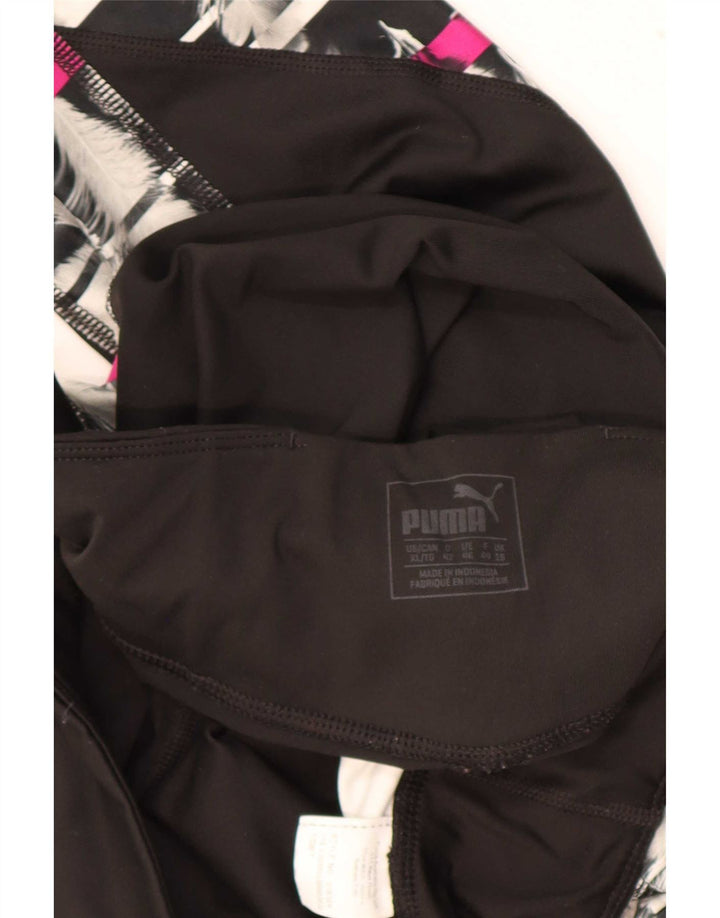 Puma ženske tajice UK 18 XL crne geometrijske