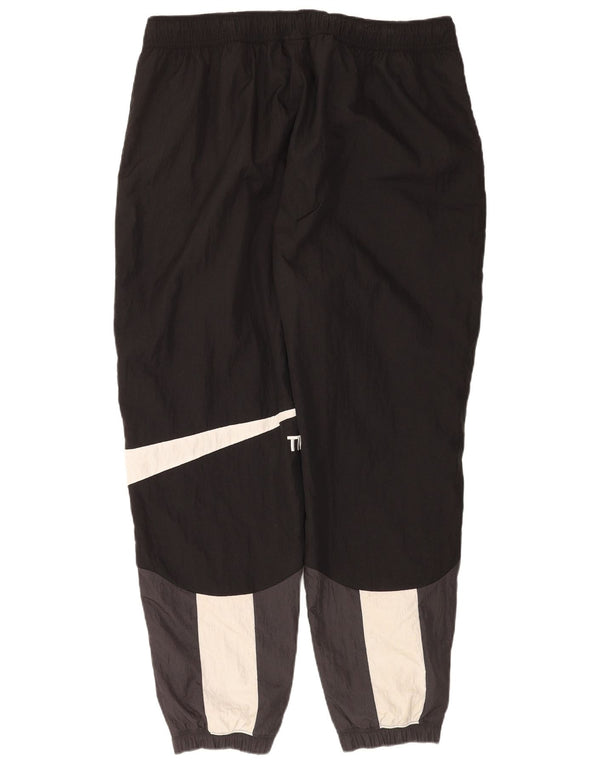 Nike muške grafičke trenirke hlače joggers 2XL crni najlon u boji