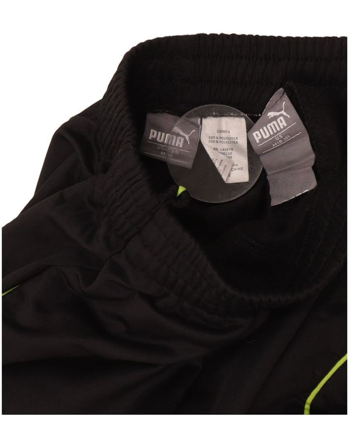 PUMA Hlače za trenirku za dječake 8-9 godina srednje crne boje od poliestera