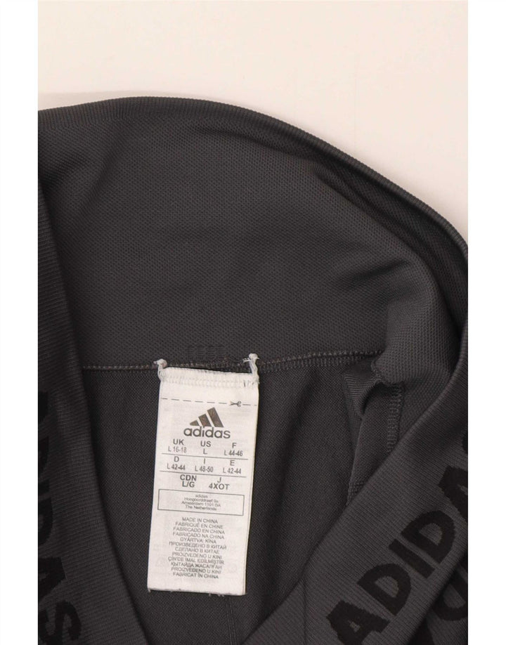 Adidas ženske grafičke tajice UK 16/18 veliki sivi poliester