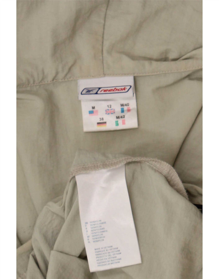 Reebok ženska kišna jakna s kapuljačom UK 12 srednje bež najlon