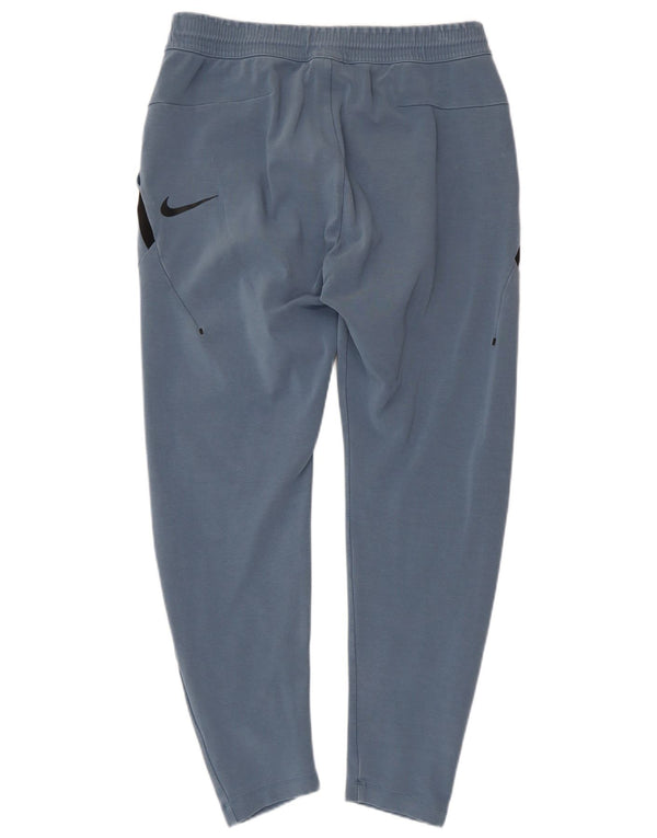 NIKE Mens Tracksuit Trousers Medium  Blue Colourblock Cotton