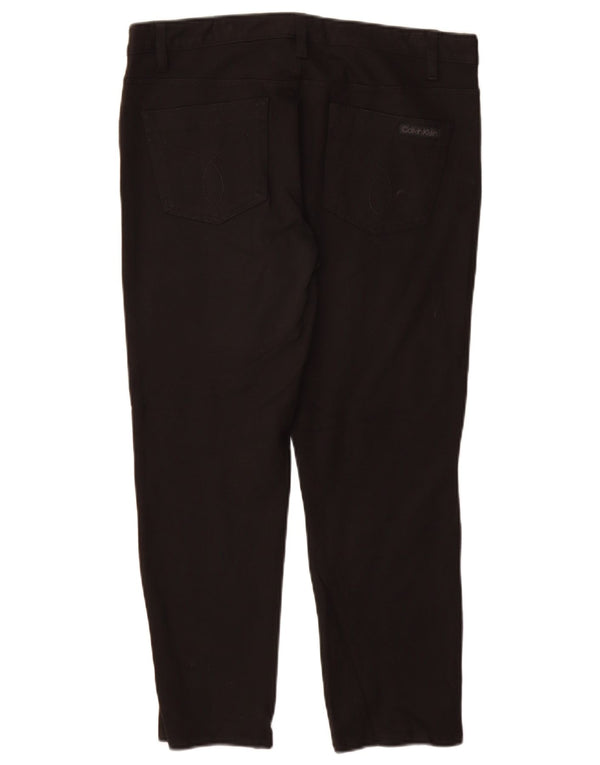 CALVIN KLEIN Ženske uske ležerne hlače US 12 Large W30 L26 crna viskoza