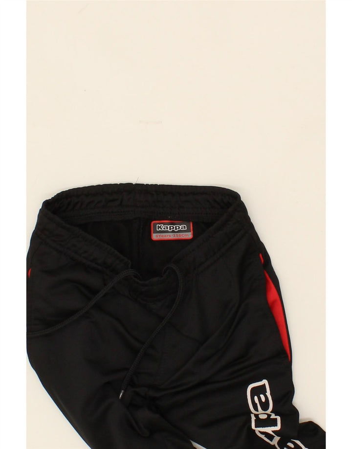 KAPPA Boys Graphic Tracksuit Trousers Joggers 5-6 Years Black Polyester Vintage Kappa and Second-Hand Kappa from Messina Hembry 