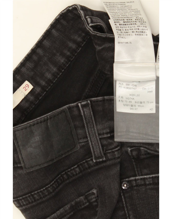 LEVI'S ženske uske traperice s otkinutim izgledom W29 L30 crni pamuk