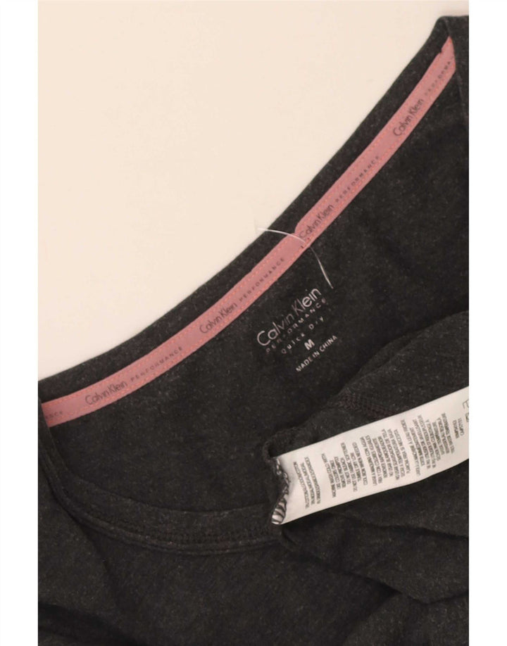 Calvin Klein Ženska majica kratkih rukava Performance Graphic Top UK 14 srednje siva