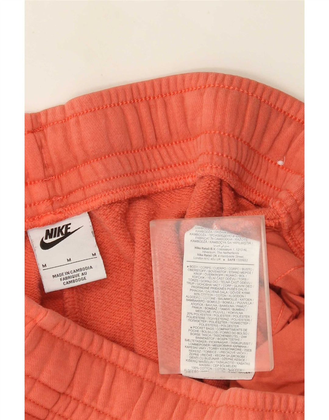 Nike muške grafičke trenirke, srednje narančaste pamučne hlače