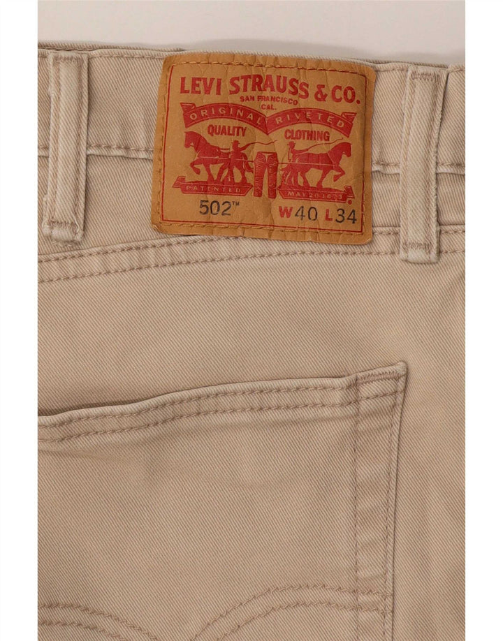 Levi's muške 502 sužene traperice W40 L27 bež