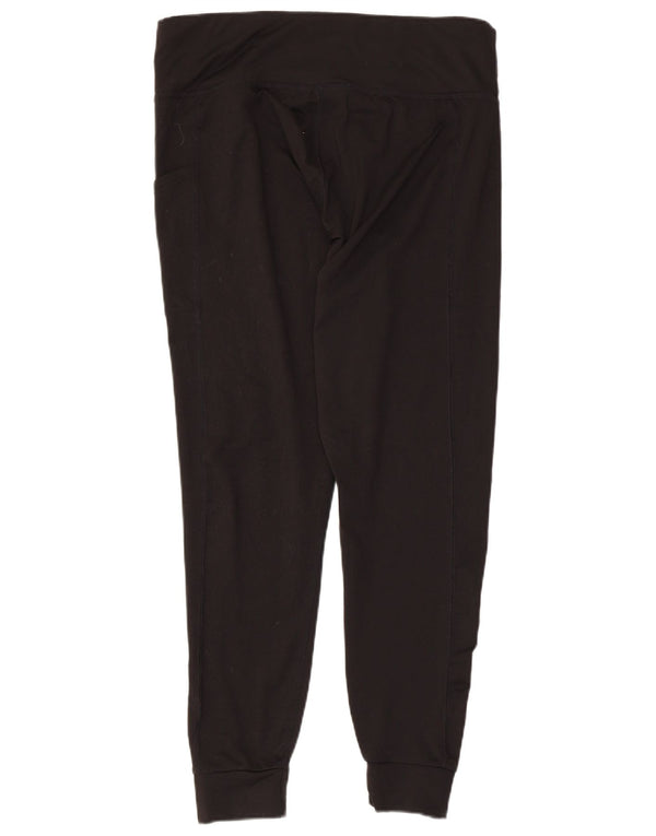 PUMA Ženska trenirka Hlače Joggers UK 18 XL crni poliester