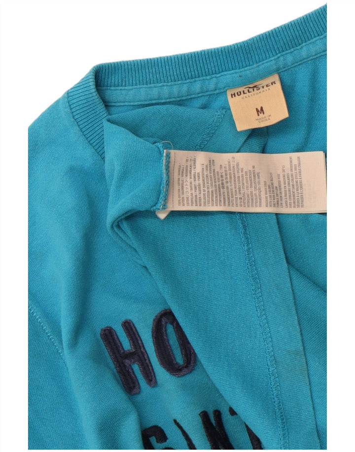 Hollister muška majica s grafičkim motivima srednje plavi pamuk