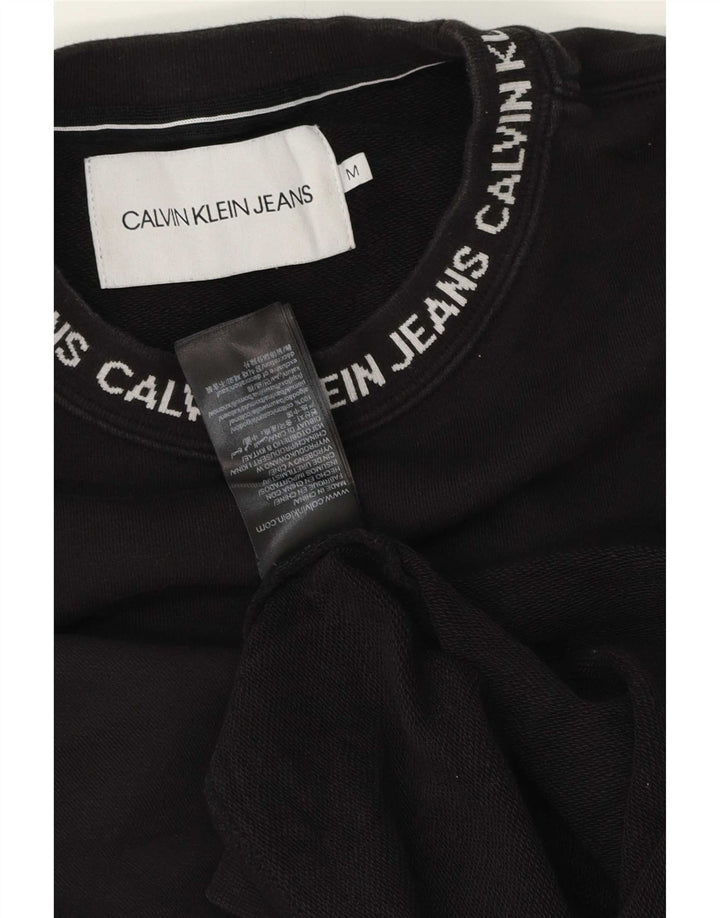 Calvin Klein Jeans muška trenirka s grafičkim motivima Srednji crni pamuk