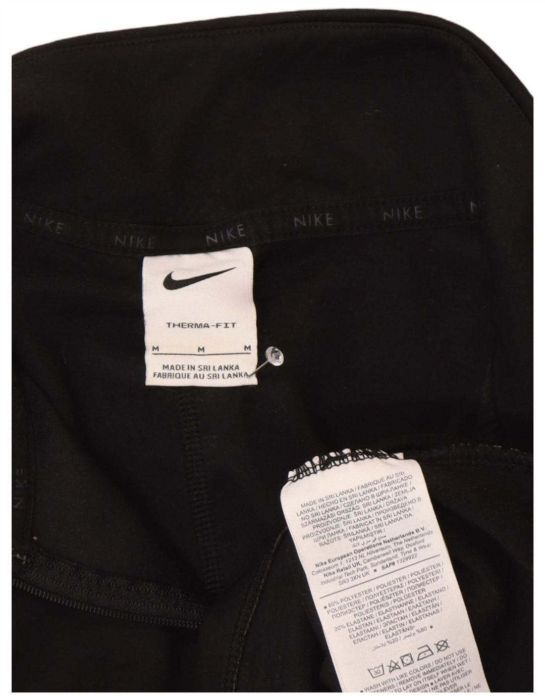 Nike ženska trenirka Therma-Fit zip izrez UK 14 srednje crna