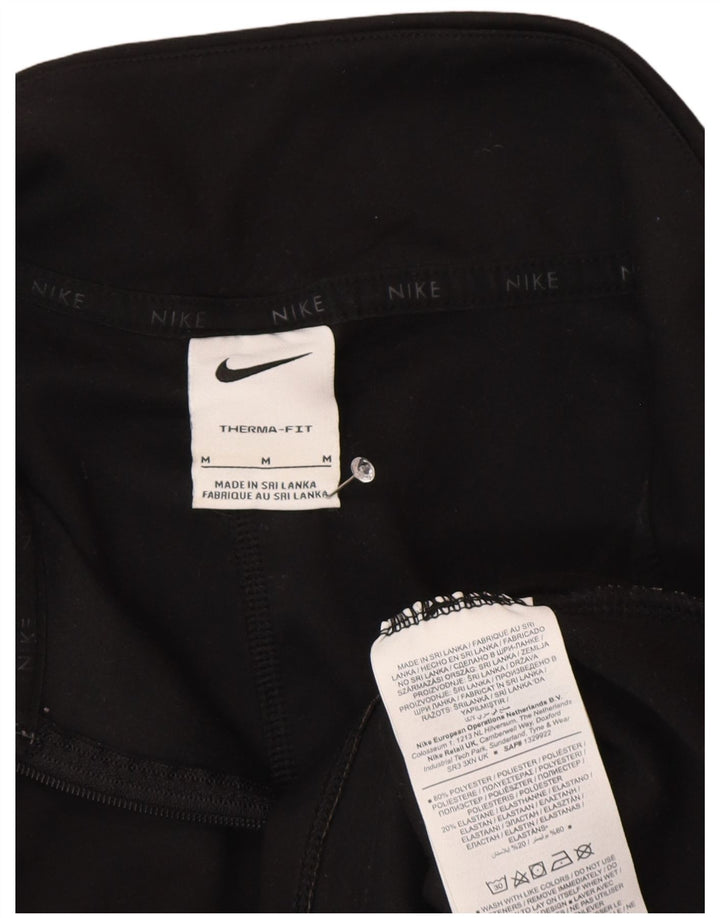 Nike ženska trenirka Therma-Fit zip izrez UK 14 srednje crna